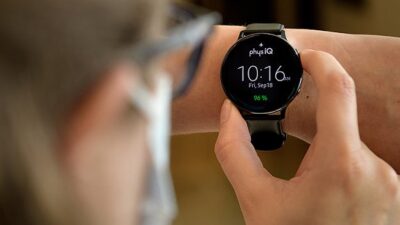 Purdue University researchers are helping to develop physIQ software that could indicate that a person should get tested for COVID-19 by detecting specific changes in heart and breathing rates while the person wears a smartwatch. Courtesy: John Underwood, Purdue University