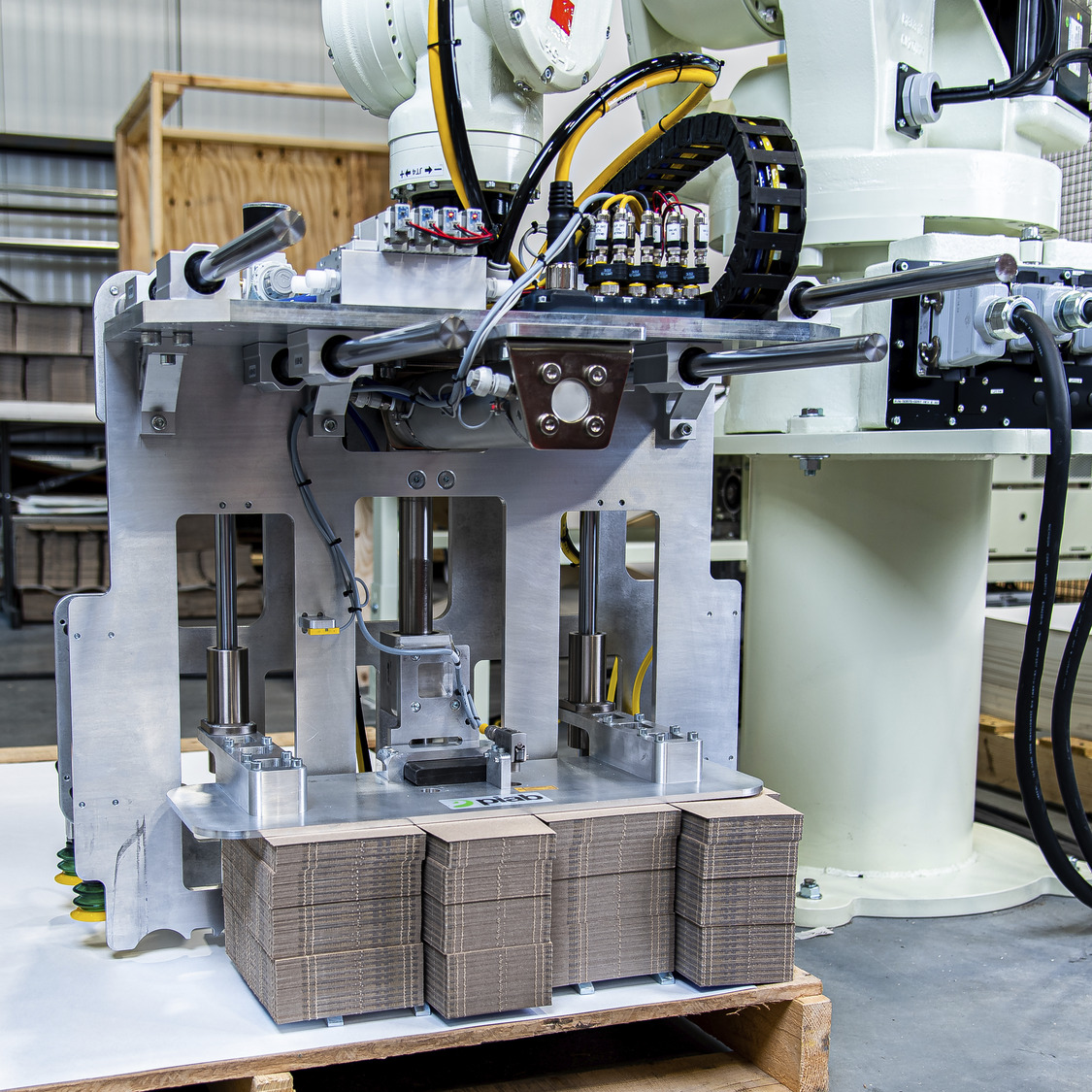 Figure 1: To ensure operator safety, the ACS team designed physical and programmable mechanisms, with the robot operating in a three-sided fenced area that runs only when gates are securely closed. Courtesy: ACS
