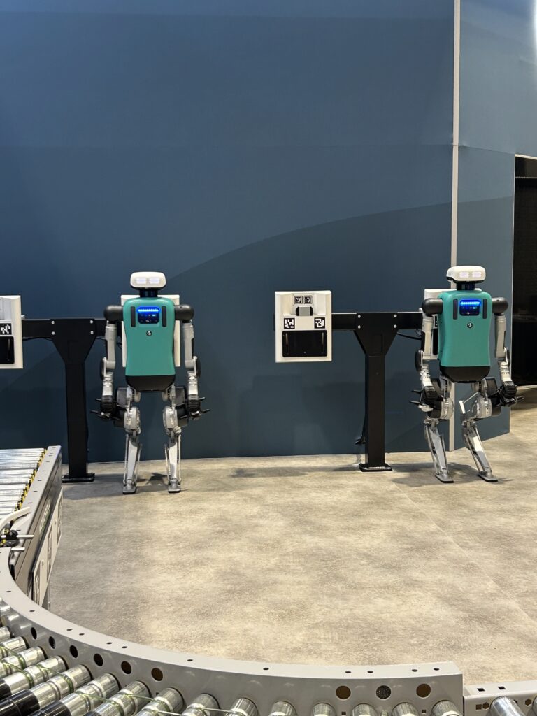 Robot workers at the Agility Robotics booth at ProMat 2025. Courtesy: Sheri Kasprzak, WTWH Media